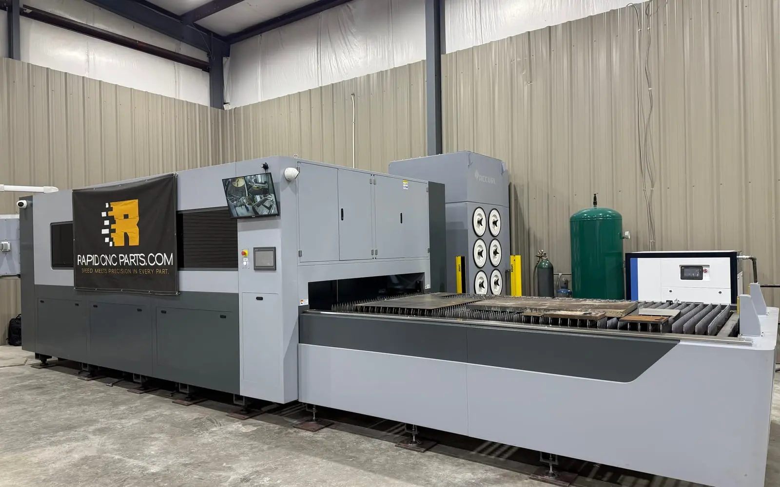 Laser-cutting machine in the Rapid CNC Parts shop